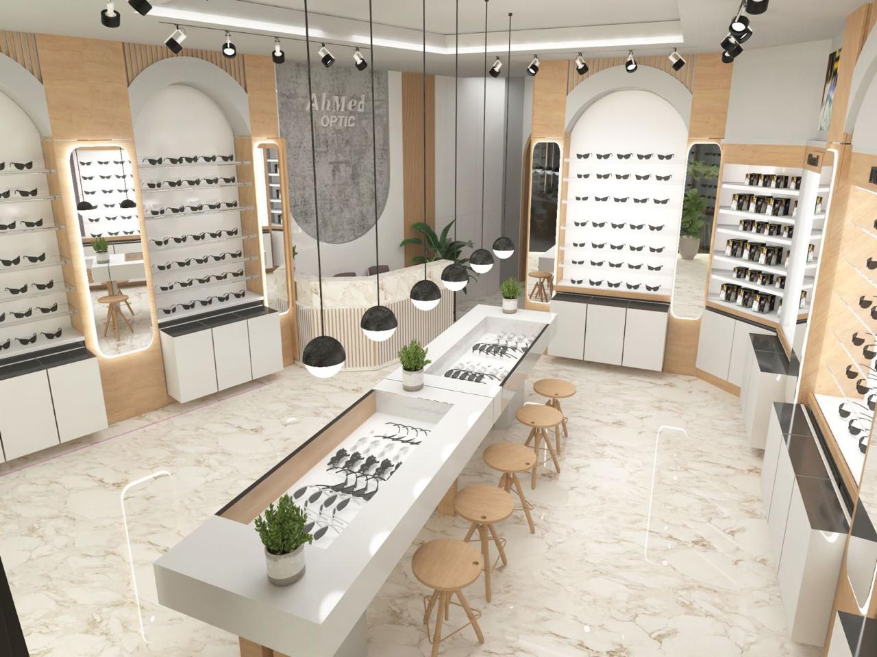 * Modern optical store interior design in Amman by Eagle Ports featuring luxury lighting and custom eyewear displays